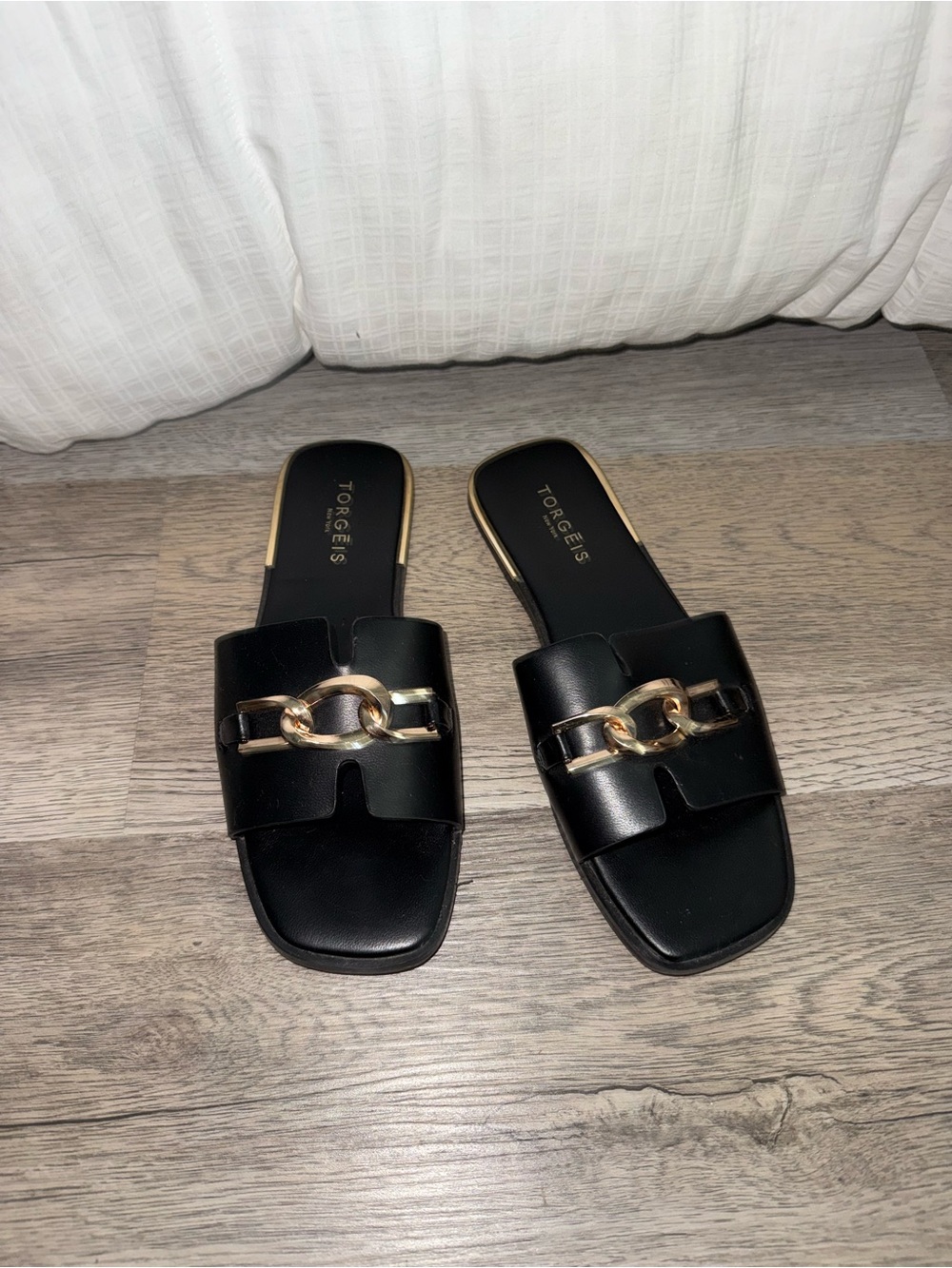 Torgeis Black Slide Sandals with Gold Chain Detail